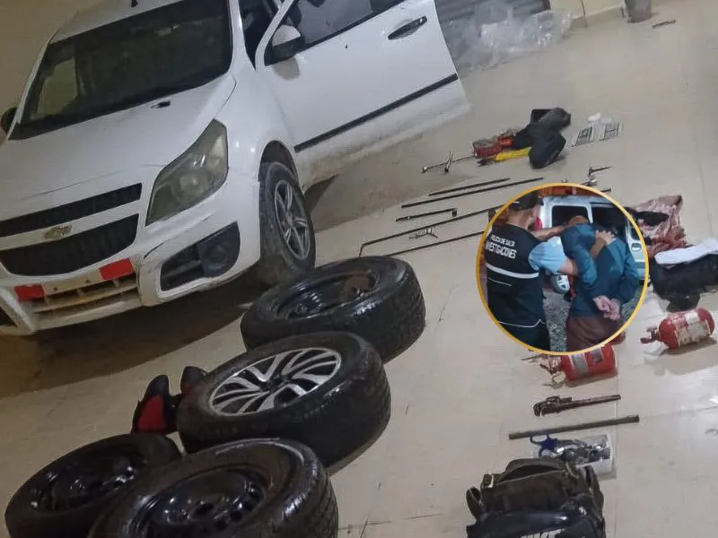 Los elementos y uno de los ladrónes detenidos.