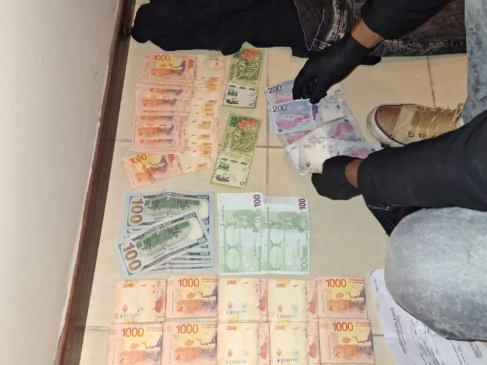 Asalto a un cambista. Dinero recuperado.